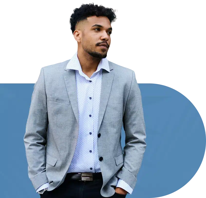 A man in a gray blazer.